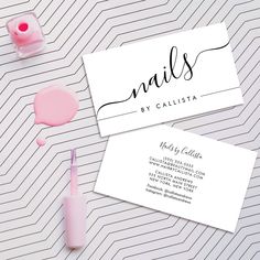 two business cards with the name nails by callistaa on them next to a pink toothbrush