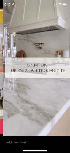 the counter top is white marble and has an advertizer on it for customers to view