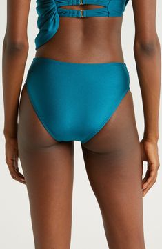 A draped, high waist sweetly shapes these bikini bottoms styled with a classic fit, versatile solid hue and moderate back coverage. Moderate back coverage Lined 82% nylon, 18% spandex Hand wash, dry flat Imported Solid Color Tankini With Wide Waistband For Poolside, Solid High Waist Stretch Swimwear, Solid Nylon Swim Skirt For Beachwear, Nylon Swim Skirt For Beachwear, Solid Color Nylon Swim Skirt For Beachwear, Solid Swimwear With Wide Waistband For Vacation, Solid Color Swimwear With Wide Waistband For Vacation, Swimwear With Wide Waistband For Vacation, Vacation Swimwear With Wide Waistband