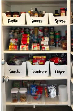 an organized pantry with white bins and food items labeled in the bottom left corner