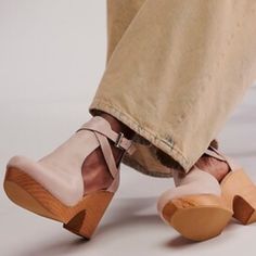 So Classic And Forever-Timeless, These Cool Clogs Are Featured In An Ankle-Grazing Style And Soft Leather With Crisscross Strappy Detailing And A Sustainably Sourced Wooden Sole. Heel: 3.75 In Shaft: 4.75 In New No Box Never Worn Spring Clogs With Wrapped Heel And Round Toe, Spring Ankle Strap Clogs With Stacked Heel, Spring Leather Clogs With Wrapped Heel, Beige Clogs With Stacked High Heel, Beige High Heel Clogs With Stacked Heel, Leather Closed Toe Clogs With Wrapped Heel, Leather Clogs With Wrapped Heel And Closed Toe, Beige High Heel Platform Clogs, Leather Mules With Wrapped Heel And Round Toe