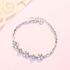 Product Information： Material: Silver Finishing: diamond set Type: bracelet Style: Women's Shape: Leaf Colour: S04 Popular elements: flowers Size: 3cm extension chain Package contents： Bracelet X1 European Women, Bracelet Style, Leaf Coloring, Diamond Set, Female Fashion, Sterling Silver Bracelet, Dress Size Chart, Cut And Style, Sterling Silver Bracelets