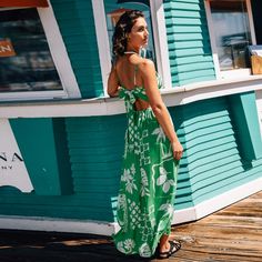 Dreaming of a getaway? Slip into this green tropical maxi dress with a unique sweetheart twist and a playful keyhole. It’s your go-to for turning heads at any resort, poolside party, or when you're simply enjoying the great outdoors. Light and airy, it ensures you stay comfortable while looking fabulous. Pair this Green Tropical Sweetheart Twist & Keyhole Maxi Dress with strappy sandals and a statement necklace for a glamorous evening look, or keep it casual with flat sandals and a sun hat for a