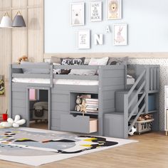 a child's bedroom with a loft bed and stairs to the top bunkbed