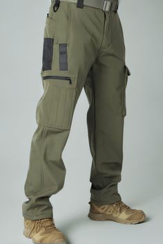 VOLCAN GREEN Tactical Pants The VOLCAN model is crafted from high-quality materials that ensure maximum durability. These men's tactical pants feature numerous practical pockets, including a side zip pocket for storing essential tools and gear. The precise fit, with elastic at the waist for maximum comfort, combined with breathable materials, guarantees comfort and optimal performance throughout the day. Perfect for outdoor conditions, military, law enforcement, security, and outdoor enthusiasts. Features: - Reinforced stitching to prevent tearing - Side zip pocket - Water-resistant - Stain and dirt repellent - Keyring for attaching keys Outer Layer: Water-resistant Materials: 90% Polyester, 10% Spandex Inner Layer: Soft and comfortable Materials: 100% Fleece 5.11 Tactical Pants, Tactical Uniforms, Mens Tactical Pants, Tactical Pants, Essential Tools, Mens Trousers, Law Enforcement, Mens Pants, Side Zip