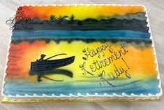 a birthday cake with a boat on the water