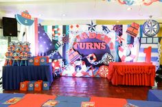 an orange and blue themed birthday party with lots of decorations