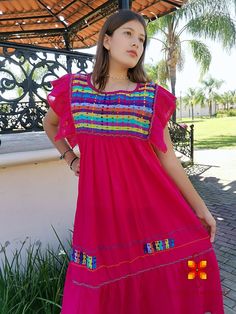 Wear your Best Moments with this mexican dress, Clothes that Shines you. Dress dress with butterfly sleeves, open at the sides to look amazing. SIZES: This dress comes as a one size ideal Medium and large sizes. Colors may vary slightly because they are handmade Each piece is unique and handmade with dedication and taking care of every detail achieving the best quality in our products, which is why it makes it beautiful and unique each of the embroidered. Material: Cotton and embroidery on loom Multicolor Folk Dress For Fiesta, Multicolor Folk Style Dress For Fiesta, Folk Style Multicolor Dress For Fiesta, Traditional Ruffle Dress For Fiesta, Multicolor Embroidered Dress For Cinco De Mayo Fiesta, Short Sleeve Embroidered Dress For Cinco De Mayo Fiesta, Bohemian Ruffle Dress For Fiesta, Bohemian Ruffled Dress For Fiesta, Traditional Pink Dress For Fiesta