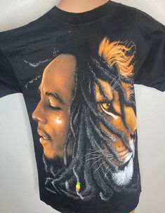 Zion Rootswear brand (Marley Co.), black t shirt with Bob Marley and Lion face printed on the front. Size small. %100 cotton, made in USA. Vintage but new! Never worn, not preowned. New/old store inventory. Bob Marley Lion, Lion Black, Lion Graphic, Lion Face, Bob Marley, Black T Shirt, Black Tshirt, Beauty Book, Lion