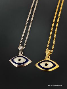 The Dainty Evil Eye Necklace is perfect for you if you're looking for something simple to wear every day. This beautiful necklace features a small evil eye charm on a sterling silver chain and will brighten your day with its protective energy and bring you good luck. This necklace comes in a silver and a 18k gold plated variant. The Dainty Evil Eye Necklace also has a matching bracelet and earrings. The Evil Eye bead is a prominent symbol in Turkish and many other cultures, and is highly protect Evil Eye Pendant Jewelry, Symbolic Evil Eye Round Pendant Necklace, Symbolic Sterling Silver Necklace With Adjustable Chain, White Sterling Silver Amulet Necklace, Symbolic Evil Eye Jewelry, Sterling Silver Amulet Charm Necklaces With Adjustable Chain, Sterling Silver Amulet Charm Necklace With Adjustable Chain, White Gold Evil Eye Pendant Necklace, Symbolic Evil Eye Pendant Jewelry