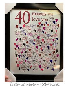 a heart shaped photo with the words 40 reasones we love you written on it