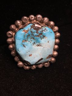 Beautiful big, unusual stone & design, one of a kind, creative 1970's hippie boho vibe sterling silver ring with part deep blue, part almost white so pale, Lone Mountain turquoise, by the highly collected Wayne Aguilar, Native American Indian artist from Kewa / Santo Domingo Pueblo.  Silver decoration surrounding stone is all hand made beads, with variation, just beautiful!...  Also with a nice shank...  with Wayne's hallmark stamp... Size 12... could be resized... if desired, please be in contact. 572.2R - This stunning piece is coming from an exciting relationship with a well known & popular Santa Fe, NM, jewelry gallery. I will be listing many exquisite, even World Class, pieces, many at lower prices than they are offered at in the gallery! The owner is a certified Gemologist who has be Unique Turquoise Ring With Natural Stones, Vintage Blue Turquoise Ring With Natural Stones, Unique Blue Turquoise Ring, Vintage Collectible Rings With Natural Stones, Vintage Rings With Natural Stones For Collectors, Bohemian Turquoise Ring With Patina For Collectors, Artisan Turquoise Ring With Large Stone Collectible, Unique Patina Rings For Collectors, Unique Turquoise Ring With Patina