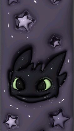 a black cat with green eyes surrounded by stars