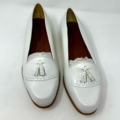 These Are New Never Worn Just In Closet. Only Has A Few Minor Issues See Last Pic. Very Light Scuff From Moving Around And Inside Shoe Back Of Heal. Other Than That In Great Condition. Please See All Pics. Questions? Leave A Comment Below! White Slip-on Tassel Loafers For Formal Occasions, Spring Formal Closed Toe Tassel Loafers, Formal Spring Closed Toe Tassel Loafers, White Leather Tassel Loafers For Spring, Formal Flat Tassel Loafers For Spring, Elegant White Tassel Loafers For Spring, White Tassel Loafers With Round Toe For Spring, White Leather Loafers With Tassels, White Tassel Loafers For Spring Workwear