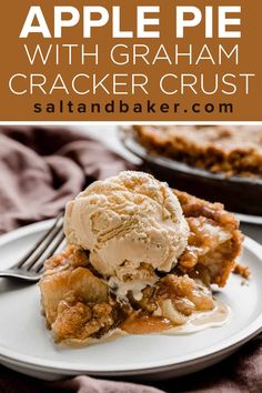 an apple pie with graham cracker crust on a white plate next to a fork