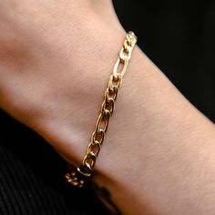 Introducing the Figaro Bracelet in Yellow Gold - 4mm, known for its classic design and sleek feel. This is the perfect piece to accentuate your fit, featuring 18k Yellow Gold links and our signature GLD clasp. Pair this with the Figaro Necklace in Yellow Gold - 4mm to complete the matching set! This product is guaranteed for life – GLD will repair or replace the item should you experience any defects in craftsmanship or breakage. Specifications - Width: 4mm - Length: 6", 7", 8", & 9" - Weight: ( Figaro Bracelet, Figaro Necklace, Vermeil Jewelry, Custom Earrings, Rose Gold Bracelet, Gold Plated Bracelets, Pendant Bracelet, Drop Necklace, Gold Design