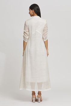 Buy Ivory Cotton Silk Woven Stripe V Neck Dress For Women by Whimsical By Shica Online at Aza Fashions. Elegant Handloom Wedding Dresses, Elegant Cotton Tunic Dress, Elegant Cotton Silk Straight Kurta Dress, Bohemian Cotton Silk Wedding Dress, White Cotton Silk Dress With Chikankari Embroidery, White Chikankari Cotton Silk Dress, White Chikankari Embroidery Dress In Cotton Silk, White Chikankari Embroidery Cotton Silk Dress, White Embroidered Hem Wedding Dress