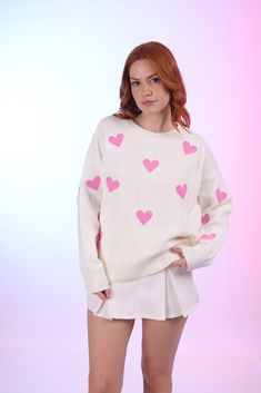 These sweaters, which are produced from 100% cotton with long sleeves with heart patterns, are one of the pieces that save life from the tour that can accomplish every moment. Capture comfort with these sweaters.Machine wash and dry hang. Oversized Long Sleeve Top With Heart Graphic, Spring Sweater With Heart Print, White Long Sleeve Tops With Heart Print, White Long Sleeve Top With Heart Print, Cute Heart Print Crew Neck Sweater, Winter Cotton Tops With Heart Graphic, White Heart Sweater For Winter, Cute Long Sleeve Sweater With Graphic Print, Winter White Tops With Heart Graphic