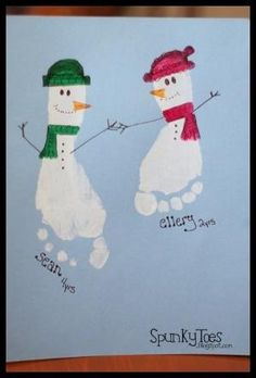 two handprints of snowmen on a blue background