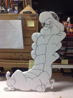 a cardboard cut out of a cartoon character