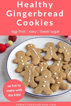 gingerbread cut - out cookies on a white plate