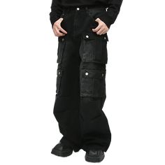 Embrace utility and style with these black multi-pocket cargo jeans, featuring large flap pockets for a bold, functional look. The wide-leg fit offers comfort and versatility, perfect for casual streetwear or edgy, utilitarian outfits. A must-have for anyone looking to combine fashion with practicality. Casual Winter Cargo Jeans With Multiple Pockets, Winter Baggy Cargo Jeans, Streetwear Cargo Jeans For Fall Full Length, Fall Streetwear Full-length Cargo Jeans, Full Length Cargo Jeans For Streetwear In Fall, Grunge Full-length Cargo Jeans For Streetwear, Winter Full-length Cargo Jeans With Pockets, Casual Black Cargo Pants With Patch Pockets, Baggy Cargo Jeans With Side Pockets For Winter