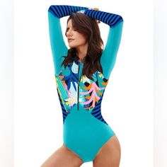 Women’s Long Sleeve Rash Guard One Piece Swim Suit Nwot Aqua Blue/Floral Print Xl Built In Bra Zipper In The Front Thumb Holes Pit To Pit 17” Rise Approximately 28” Sleeve Length From Neck 30 1/2” 82% Nylon 18% Spandex Pallet Purchase New To Poshmark? Use My Code Hollyhobby669 To Receive $10 Off Your First Purchase . Fast Shipper Orders Placed By 1:30 Est Monday-Friday Non Holidays Shipped Same Day Pp-21mc Blue Long Sleeve Swimwear For Vacation, Fitted Blue One Piece For Poolside, Blue Fitted One-piece For Poolside, Fitted Blue One-piece For Poolside, Blue Long Sleeve Swimwear For Summer, Fitted Blue One Piece Beachwear, Blue Long Sleeve Printed Bodysuit, Fitted Blue One-piece Beachwear, Printed Blue One-piece Swimsuit For Pool