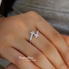 This double cross wrap ring will be crafted from precious metals of your choice:  10K Gold, 14K Gold or 18K gold. Choose Cubic Zirconia Stones or Diamonds. Perfect for everyday wear and beautiful gift for any occasion. Metal options: * 10K gold (yellow, rose or white) * 14K gold (yellow, rose or white) * 18K gold (yellow, rose or white) Sizes: 5 to 11 Ring is slightly adjustable for comfort fit. Please write your ring size in personalization instructions. ----------PRODUCTION TIME----------- All Diamond Cross Ring For Gift, Diamond Cross Rings For Gifts, Cross-shaped Diamond Ring For Gift, White Gold Cross-shaped Promise Ring, Adjustable Cross-shaped Ring For Anniversary, Minimalist Cross Ring For Anniversary, Diamond Cross Ring For Anniversary, Sterling Silver Cross Ring For Promise, Anniversary White Gold Cross Rings