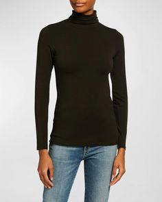 This Soft Touch Long-Sleeve Turtleneck from Majestic Filatures is the perfect mix of coziness and style. Crafted from a viscose-wrapped elastane that delivers four-way stretch and antimicrobial comfort, this top hugs your curves for an on-trend look. The turtleneck and long sleeves keep you warm while staying breathable. Wear it for lounging or pair it with your favorite jeans for an effortlessly cool Instagram selfie. Best of all, the anti-pill fabric means it stays just as soft after many wash High Stretch Mock Neck Top For Fall, Fall Mock Neck Top With High Stretch, Fitted Long Sleeve Elastane Turtleneck, Fall Long Sleeve Elastane Turtleneck, Fall Turtleneck Mock Neck Top In Elastane, Fitted Mock Neck Top In Elastane For Fall, Second-skin High Neck Top For Fall, Stretch Elastane Tops For Fall, Stretch Elastane Long Sleeve Top For Fall