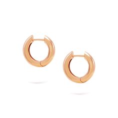 Add a touch of sophistication to your daily style with the Goldens Hoops earrings. Crafted from 14K gold, these medium-sized hoops are perfect for everyday wear. Their timeless and classic golden glow makes them versatile to any jewelry collection. Classic Small Hoop Rose Gold Huggie Earrings, Classic Rose Gold Small Hoop Huggie Earrings, Classic Rose Gold Huggie Hoop Earrings, Timeless Rose Gold Huggie Earrings As Gift, Minimalist Rose Gold Hoop Earrings With Polished Finish, Modern Rose Gold Hoop Earrings For Everyday Wear, Classic 14k Rose Gold Huggie Earrings, Classic Rose Gold Huggie Earrings, Classic Rose Gold 14k Huggie Earrings