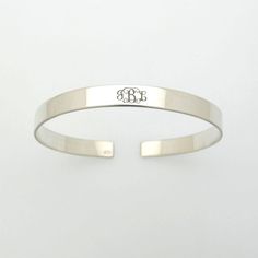 Sterling Silver Monogram Bracelet, Initials Cuff Bracelet, stacking bracelet, Engraved Inspirational Quote, Personalized Gift, Meaningful Gift, Wife or Girlfriend Gift Bracelet, Birthday Gift, Mothers day gift, Valentines day gift Fashionable custom bracelet, suitable to any wear. Personalized monogram bracelet crafted of high quality metal. The bracelet is crafted of sterling silver. Polished to a bright shine, it can be engraved with a beautiful monogram made of your initials. can both sides e Personalized Minimalist Bangle Cuff Bracelet, Minimalist Personalized Bangle Cuff Bracelet, Classic White Name Bracelet As Gift, Classic Customizable Name Bracelet For Gift, Classic Cuff Bangle For Anniversary, Classic Cuff Bangle, Engraved Cuff Bracelets For Anniversary, Engraved Cuff Bracelet For Anniversary, Silver Customizable Cuff Bangle Bracelet