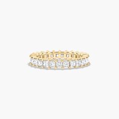 This timeless eternity ring features the boldness and intense sparkle of princess cut diamonds. A classic, tailored shared prongs setting allows the maximum amount of the diamonds surface to show. *Number of diamonds and carat total weight will vary depending on ring size. Yellow Sapphire Rings, Princess Cut Gold, Rings Mens Wedding Bands, Diamond Eternity Ring, Classic Wedding Rings, Platinum Wedding Rings, Pink Sapphire Ring, Round Cut Engagement Rings, Diamond Anniversary Rings