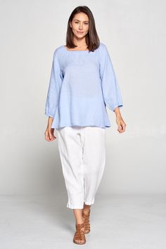 "- Square neck top - Loose flowy fit - 3/4 sleeves - Comfortable breezy - Great for any occasion - 100% linen - Made in USA Size measurements Style was measured laid flat. Please multiply by two to get approximate circumference *Small bust : 20.5\" waist : 22.5\" bottom \" 29\" length : 26\" sleeve : 19\" *Medium bust : 21.5\" waist : 23.5\" bottom : 29.5\" length : 26.25\" sleeve : 19\" *Large bust : 22.5\" waist : 24.5\" bottom : 30\" length : 26.5\" sleeve : 19.5\" *XL bust : 23.5\" waist : 2 Spring Flax Relaxed Fit Blouse, Spring Tunic With 3/4 Sleeve And Relaxed Fit, White Linen Tops With 3/4 Sleeve, Spring Flax Color Tops For Daywear, Flax-colored Relaxed Fit Tops For Spring, Linen Tops With 3/4 Sleeves For Daywear, Spring Long Sleeve Flax Blouse, Spring Flax Long Sleeve Blouse, Short Tank Top