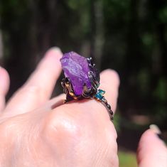 This Is A Beautiful Huge Raw Amethyst Crystal Set On A 925 Sterling Silver Ring Covered With Rhodium And 24k Gold Accents. The Little Blue Stones Are Topaz. This Is A Perfect Cocktail Ring As Its Dramatic & Stunning! It Is A Size 8 With A Beaded Style Band. Please Ask Questions And Make An Offer. I Can't Say Yes If You Don't Ask! Amethyst Crystal Ring With Gemstone Accents For Gift, Unique Multi-stone Purple Amethyst Ring, Unique Multi-stone Amethyst Ring, Unique Purple Multi-stone Amethyst Ring, Unique Purple Amethyst Ring With Accent Stones, Mystical Amethyst Purple Ring, Mystical Purple Amethyst Rings, Purple Amethyst Crystal Ring With Natural Stones, Amethyst Multi-stone Crystal Ring As Gift