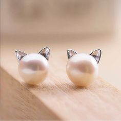 Brand New Boutique Item Gorgeous Cat Ears Little Pearl Earrings. Girly Design Light Earrings. Pretty Jewelry Accessories. Earrings With A Simulated Pearl And Kitten Ears Design. Simulated Round Pearl Earring Stud Silver Metal Cute Cat Earring. Perfect For A Small Birthday Present Or A Christmas Gift For An Elegant Lady Or Girly Girl. Bundle And Save! 3 For 30$ All Earrings With A . Cute Cat Design Earrings For Party, Elegant Cat Ears Jewelry With Cat Design, Cute White Cat Ears Jewelry, Cute White Cat Design Jewelry, White Cat Design Jewelry With Cat Ears, Cute White Jewelry With Cat Design, Elegant White Cat Design Jewelry, White Cat Design Earrings For Gift, White Cat Design Earrings As A Gift