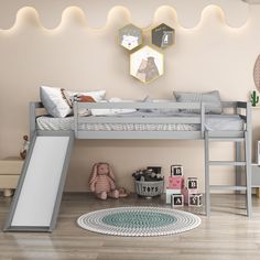 a child's bedroom with bunk beds and toys