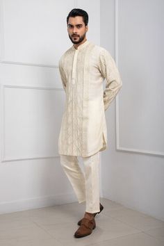 Ivory kurta with thread, beads embroidery in geometric pattern. Paired with coordinating pant. - Aza Fashions Traditional Straight Kurta With Geometric Embroidery, White Cotton Kurta With Geometric Embroidery, Transitional Cotton Kurta With Geometric Embroidery, Festive Straight Kurta With Geometric Embroidery, Traditional Kurta With Geometric Embroidery For Eid, Unstitched Off-white Kurta For Reception, Festive Eid Kurta With Geometric Embroidery, Traditional Sets With Geometric Embroidery For Transitional Season, Cotton Kurta With Geometric Embroidery For Eid