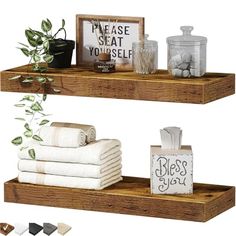 two wooden shelves holding towels and other items