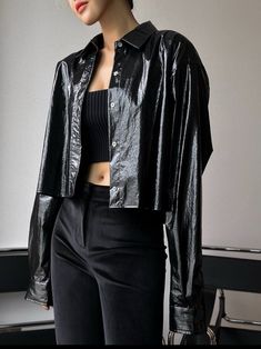 Cropped button down shirt with collar. Metallic foil look. Cuffed sleeve. Vegan leather blend. Model is in MINUSEY ONE SIZE. ✔️ Free worldwide express shipping over $100✔️ Loved by 6,500+ customers✔️ Limited edition collections, maximum styleStay ahead of the trend with can’t-find-anywhere-else staples. Your closet will thank you 💕 * MINUSEY ONE SIZE = EU 34-38, US 2-6* 91% Nylon / 9% PU Leather* Dry clean* Made in Korea - Model Height: 172cm/5'7" (US2, EU34) Black Collared Shirt For Night Out, Collared Black Shirt For Night Out, Black Button-up Shirt For Night Out, Fall Shirt With Buttons For Night Out, Cropped Button Down, Shirt With Collar, Cuffed Sleeve, Metallic Foil, The Trend