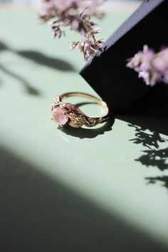 ✵ Learn more about us: www.edengardenjewelry.com ✵ WhatsApp number for urgent questions: +34 690 701 654 E-mail: edengardenshop@gmail.com This beautiful rose quartz engagement ring is made of rose gold looks really delicate and charming. Our unique engagement jewelry may be an exquisite and unique gift for your wife, bride, girlfriend or any other special woman in your life. This romantic ring is handmade from solid 14K rose gold and adorned with natural rose quartz, 6 mm size. Nature ring featu Delicate Morganite Rings With Rose Cut Diamonds, Nature-inspired Rose Gold Gemstone Rings, Delicate Morganite Promise Ring, Delicate Morganite Rings For Promise, Rose Gold Rose Quartz Promise Ring, Delicate Rose Gold Morganite Ring, Delicate Morganite Ring, Delicate Rose Gold Moonstone Ring, Cottagecore Wedding Ring