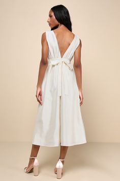 Elegant Destiny Cream Sleeveless Bow Midi Dress Chic Sleeveless Midi Dress For Wedding, Elegant Sleeveless Midi Dress With Tie Back, Sleeveless Midi Dress For Bridesmaids, Sleeveless Tie Back Midi Dress For Wedding, Silk Sleeveless Maxi Dress With Tie Back, Knee-length Satin Sleeveless Dress For Summer, White Sleeveless Midi Dress For Bridesmaids, Chic Sleeveless Midi Dress With Tie Back, Summer Sleeveless Midi Bridesmaid Dress