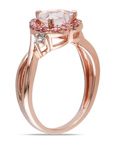 This pretty ring features a heart-cut morganite surrounded by contrasting pink tourmalines. The ring is accented with round diamonds and is set in rose gold plated silver. Macy's Luxury Rings As A Gift, Luxury Macy's Rings As Gifts, Macy's Luxury Rings As Gifts, Morganite Rings With Gemstone Accents, Fine Jewelry, Macy's Gemstone Wedding Rings, Round Morganite Jewelry With Gemstone Accents, Morganite Jewelry With Gemstone Accents, Elegant Macy's Jewelry With Center Stone, Elegant Morganite Ring With Gemstone Accents