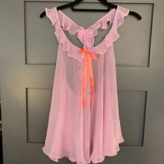 Adorable Set, Never Worn. Light Pink/Purple With Coral Ribbon Detail. Included Matching Side Tie Panties In Size Small. A Couple Small Snags On The Ribbon As Shown In The Last Picture. Not Noticeable When Wearing. Summer Backless Nightgown For Loungewear, Backless Summer Sleepwear For Loungewear, Backless Summer Loungewear Sleepwear, Summer Backless Loungewear Sleepwear, Victoria's Secret Purple Sleepwear For Bedtime, Flirty Sleeveless Sleepwear For Pajama Party, Victoria's Secret Feminine Sleeveless Sleepwear, Pink Sleeveless Sheer Sleepwear, Pink Ruffled Nightgown For Pajama Party