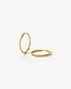 Classic Small Hoop Earrings | 18ct Gold Plated 18ct Gold Plated Vermeil. Introducing Our Lightest Ever Hoops — an Elevated Collection of Everyday Essentials that are Anything but Basic. These Simple Hoops Have Been Handcrafted to Become Your New Core Staples. Plus, they Feature a Hidden Hinge for a Seamless Closure. Wear Solo or Style with Studs and Mini Hoops for an Instant Ear Stack. Also Available in Medium, Large and Oversized. Metal: 18Ct Recycled Gold Plated Vermeil on Recycled Sterling Si Gold And Silver Earrings, Hoop Earring Set, Malachite Necklace, Small Hoop Earrings, Ear Stack, Star Earrings Stud, Hoop Earring Sets, Pearl Pendant Necklace, Recycled Gold