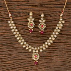 ZohraArts Gold-Plated Indian Jewelry kundan Choker Set with Necklace and Earrings. Indian Bridal Traditional Jewelry Sets. Very Gorgeous and elegant one 24 k thick micron gold plated dainty Polki necklace set Comes with matching earrings Earrings: Pushback Necklace Closure: adjustable via a handmade chord ( slide lock) Highest quality and craftsmanship Ready to ship from New Jersey, United States Kundan Pearl Necklace With Meenakari For Puja, Red Kundan Jhumkas With Zari Work, Red Traditional Jewelry Sets With Cutdana, Traditional Red Jewelry Sets With Cutdana, Red Temple Jewelry Bridal Sets For Diwali, Red Kundan Necklace With Stone Work, Red Kundan Necklaces With Meenakari, Red Kundan Necklace With Stone Work For Puja, Red Kundan Necklace With Meenakari Detail