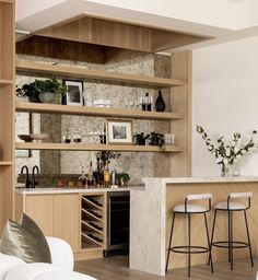 the kitchen is clean and ready to be used as a wine bar or home bar