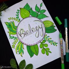 a coloring book with green leaves and the word biebegy written in it