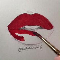 a drawing of a woman's lips with red lipstick