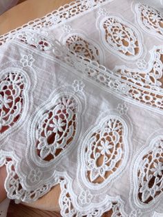 the table is covered with white doily