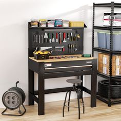 a workbench with tools and other items on it in a home office setting